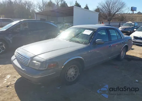 1999 Ford Crown Victoria Lx z USA, uszkodzony, nr VIN 2FAFP74W2XX238284